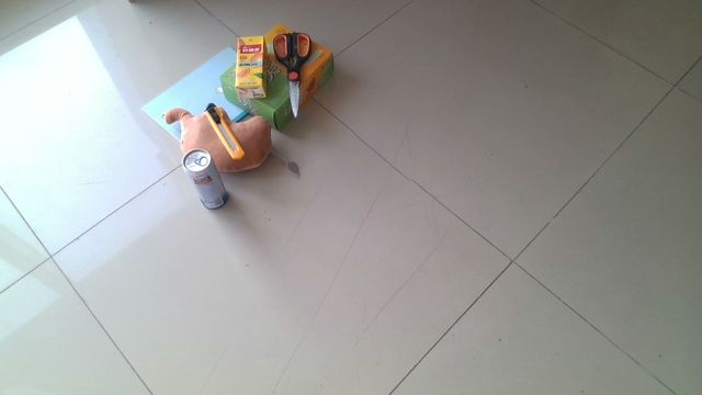 Objects on a tiled floor