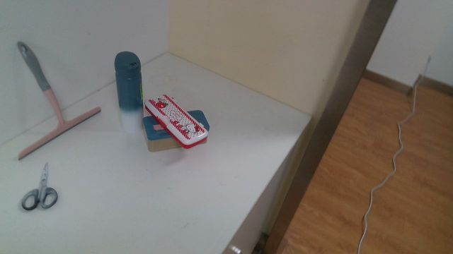 Objects on another desk